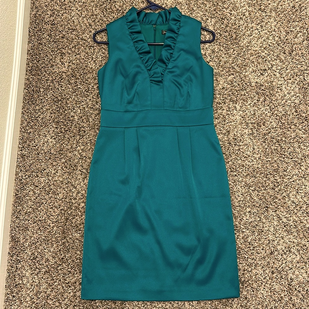 Emerald green ruffle neckline party dress